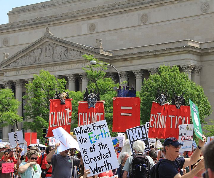 File:People's Climate March 2017 in Washington DC 25 - Marchers pass the US National Archives with signs, "What comes from Earth is of the Greatest Worth," "Climate Change Equals Extinction".jpg