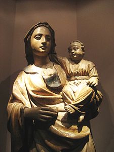 A mid-16th century statue of Mother Mary with accompanying baby Jesus