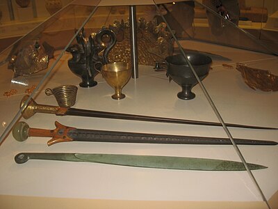 Replicas of Mycenaean swords and cups.jpg