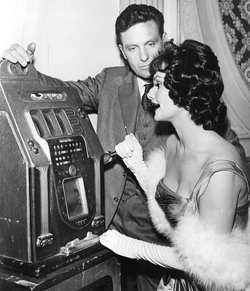 Stack as Eliot Ness with Gloria Talbott, 1962