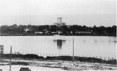 View of the blown-up causeway, with the gap visible in the middle, which delayed the Japanese conquest for over a week, to 8 February