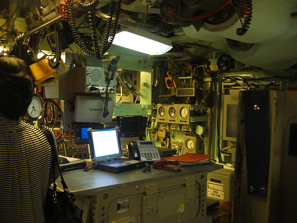 The aft end of the control room for USS Jefferson City in June 2009