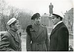 Norsk student (i svart lue) under en studentdemonstrasjon i Uppsala i Sverige 4. desember 1943. Demonstrasjonen var en protest mot de tyske okkupantene som hadde sendt Oslo-studentene til fangeleirer like før. Foto: Riksarkivet