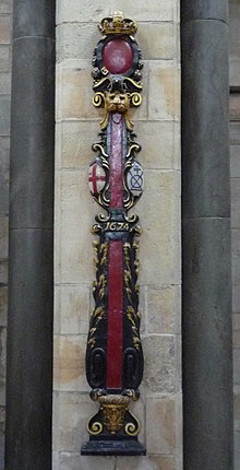 This sword rest, now in Southwark Cathedral, formerly stood in the church. It bears the Bridge Mark (blue logo on right-hand side) of the Bridge House which was nearby. Sword rest TQ3280 427.jpg