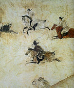 Polo players wearing yuanlingpao with tight sleeves on horseback, Tang dynasty