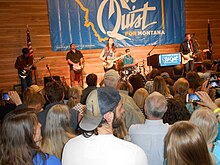 "Team Quist and the Berners" 2017 campaign rally appearance featuring Quist's grown children Halladay (with banjo) and Guthrie (guitarist to right of lectern) Team Quist.jpg