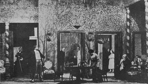 In Stanislavski's production of The Cherry Orchard (Moscow Art Theatre, 1904), a three-dimensional box set gives the illusion of a real room. The acto