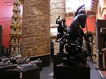 The West Court which predominantly contains casts of Northern European and Spanish sculpture and Trajan's Column. This room is full of plaster cast copies of famous world statues, sculptures and monuments.jpg