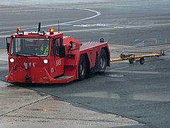 Pushback tug with the towbar behind
