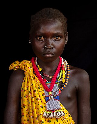 Portrait of a girl from the Laarim Tribe, Kimotong, Kapoeta State, South Sudan.