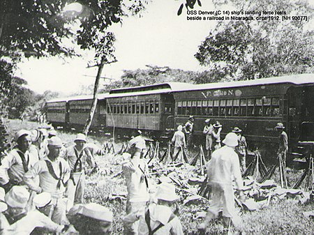 USS Denver ship's landing force under Lt. A. B. Reed rests beside the Corinto, Nicaragua railroad line, 1912 USS Denver Nicaragua Landing Force 1912.jpg