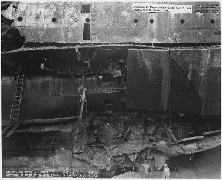 File:USS Oklahoma (BB37)- Salvage, 12-31-43, 7126-43, Port side at about fr 60 after removal of main patch in drydock - NARA - 296956.jpg