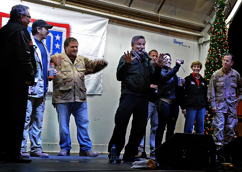 File:US Navy 101217-N-6266K-252 omedian Robin Williams is joined on stage by fellow United Service Organizations, entertainers, and Chairman of the Join.jpg