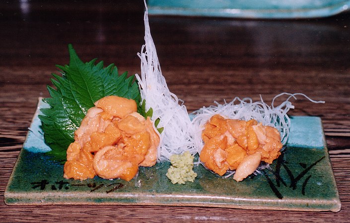 Sea urchin (uni) as sashimi with a dab of wasabi