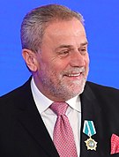 Six-term mayor Milan Bandic (BM 365) was seeking re-election but died during the pre-election campaign period, after 17 years and 165 days in office. Vladimir Putin at award ceremonies (2018-11-04) 02 (cropped) (2).jpg