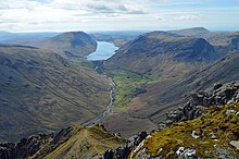 The view towards Wast Water from the cairn built by the Westmorland brothers in 1876 to the SW of the summit of Great Gable, which they considered the finest view in the district. Westmorland cairn Great Gable.jpg