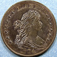 Na lícové straně mince zobrazující alegorickou ženu.
