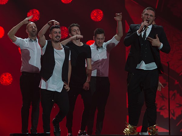 Ziv is the first on right, behind Nadav Guedj during the 2015 Eurovision contest