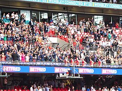 Hull Kingston Rovers players begin to collect their runners-up awards, the Challenge Cup in their sights, on the Royal Balcony at the 2023 Challenge Cup Final.