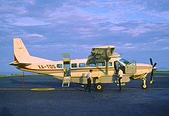 The same aircraft at Puerto Escondido International Airport (July 2003) 252aa - Aerotucan Cessna 208B Grand Caravan; XA-TDS@PXM;28.7.2003 (6160875320).jpg