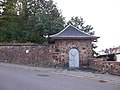 Transformer house and embankment wall