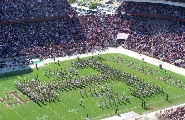 "ATM" formation during halftime at Kyle Field, a variation of the "Block T" created by Dunn