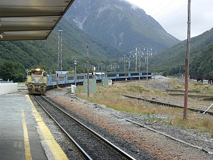 A TranzAlpine train arriving at the Arthur's Pass station in the South Island. The TranzAlpine route is considered to be one of the most beautiful in the world, and Arthur's Pass National Park is a favourite stop.