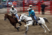 Riders at the Black Heritage Day Rodeo presented by the Black Professional Cowboys and Cowgirls Association in Humble, Texas, in 2022 BPCCA Presents Black Heritage Day & Rodeo (51980375643).jpg