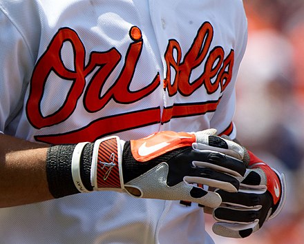 A close-up of a Baltimore Orioles player's batting gloves