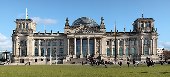 The Reichstag building seen from the west. Inscription translates to "For/To the German People"