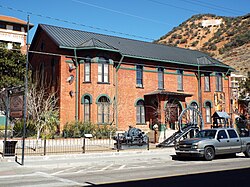 The Phelps Dodge Headquarters Building was built in 1896 and is located in 5 Copper Queen Plaza, Bisbee, Az. The building was the headquarters of the Phelps Dodge Mining Co. from 1896 to 1961. It now houses the Bisbee Mining & Historical Museum. It was the first museum in the southwest to be distinguished as a Smithsonian Affiliate Museum. The building was listed in the National Register of Historic Places on June 3, 1971, reference #71000109. Bisbee-Phelps Dodge Headquarters-1896.JPG