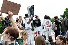 Clothing items used to express beliefs during a Black Lives Matter protest. Black Lives Matter Vienna 2020-06-04 29.jpg