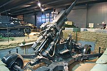3.7 inch HAA gun preserved at Imperial War Museum, Duxford. Used in HAA and medium roles in Normandy. British 3.7 inch Anti-Aircraft Gun (5781172513).jpg