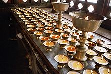 In Tibetan Buddhism, lighting butterlamps for the deceased symbolises the hope that he is free of suffering and his soul will reach enlightenment. ButterLamps.jpg