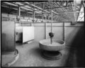 CIRCULAR WASH BASIN, TOILETS ABOVE ROOF PANEL STORAGE AREA. VIEW TO WEST-NORTHWEST. - Ford Motor Company Long Beach Assembly Plant, Assembly Building, 700 Henry Ford Avenue, HAER CAL,19-LONGB,2-A-29.tif