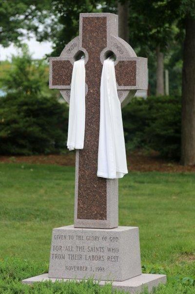 Celtic cross draped for Easter at a Presbyterian church