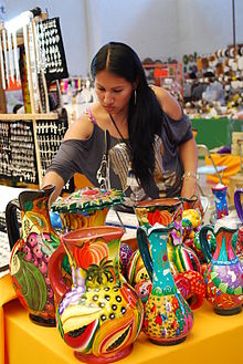 Woman selling pottery items at the Feria de Texcoco, Texcoco, Mexico State CeramicsFeriaTexcoco.JPG