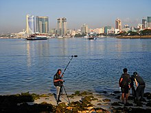 Film team at Port of Dar es Salaam with two ferries Creating documentary 01.jpg