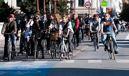 Urban cyclists in Copenhagen, Denmark, at a traffic light