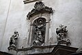 English: Detail of statues above door of Monastery of Minorits in Brno-Center. Čeština: Detail soch nade dveřmi minoritského kláštera v Brně-Středu.