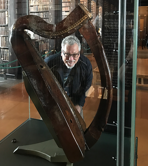 Dick Lyon with Brian Boru's harp