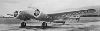 Amelia Earhart's Lockheed Electra 10E. During its modification, the aircraft had most of the cabin windows blanked out and had specially fitted fuselage fuel tanks. The round RDF loop antenna can be seen above the cockpit. This image was taken at Luke Field on March 20, 1937; the plane would crash later that morning.