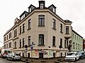 Wohnhaus (Anschrift: Endersstraße 64) in geschlossener Bebauung und in Ecklage, mit Fabrikgebäude (Anschrift: Engertstraße 13) zum Hof