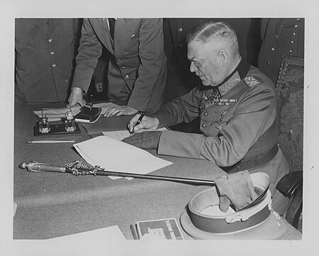ไฟล์:Field_Marshall_Keitel_signs_German_surrender_terms_in_Berlin_8_May_1945.jpg