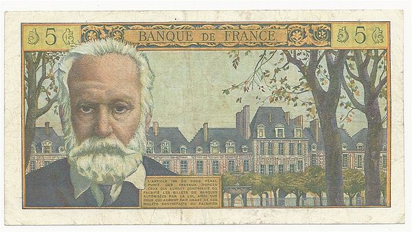 The reverse of a 5 French francs 1959 banknote of the French national bank (Banque de France) with a portrait of Victor Hugo. To the right is an image