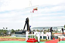 Commissioning of INS Karna, a dedicated base for MARCOS Hoisting of the Naval Ensign for the first time at INS Karna on the occasion of Commissioning.jpg