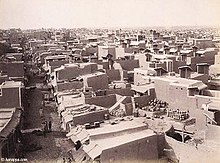 Hyderabad in the late 1800s. The triangular structures on the rooftops are wind catchers, funneling cool breezes into homes below. Hyderabad1800s.jpg