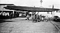John J Sesnon Company's cabeway lifting 12 ton dredge stacker, Nome, Alaska, between 1905 and 1915 (AL+CA 5929).jpg