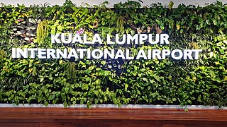 File:KLIA plant wall sign.jpg