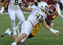 Alonso (47) with the Oregon Ducks in 2012 Kiko Alonso at 2012 USC game (cropped).jpg